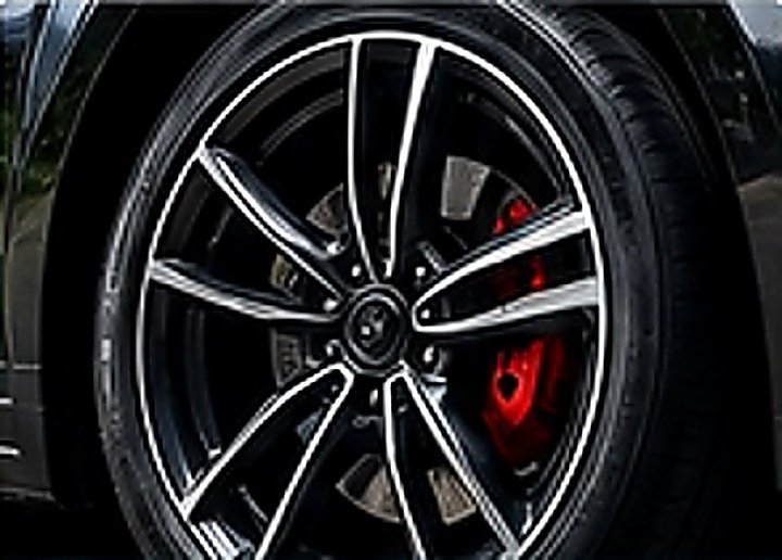 Alloy wheel with red brake caliper